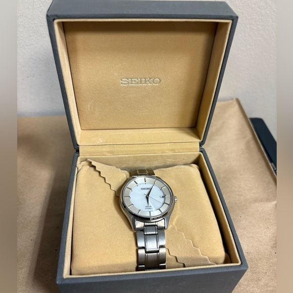 Other - SEIKO V157-0BX0 SBPX101 TITANIUM DATE SOLAR MENS WATCH